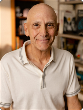 Girl with a finger over mouth.