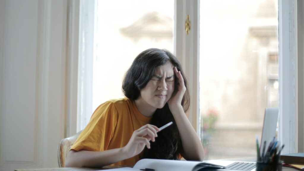 Woman experiencing a brain zap.